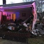 Damage to a house in Foxborough after a car crashed into the building Friday morning.