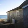 A seaside home, boarded up for the winter, in Provincetown, Mass., Dec. 15, 2015. Second-home owners and investors now own 71 percent of the homes in the popular summer vacation town. ()