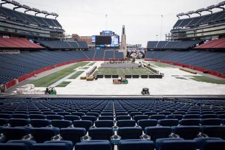 Foxboro, MA - 12/21/2015 - Workers lay the foundation for the ice rink to be used for the NHL winter classic game at Gillette Stadium in Foxboro, MA, December 21, 2015. (Keith Bedford/Globe Staff) 
