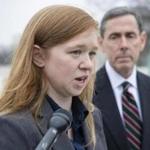 Abigail Fisher, who challenged the use of race in college admissions, was joined by lawyer Edward Blum (right) as spoke to reporters outside the Supreme Court in Washington. 