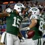 ARLINGTON, TX - DECEMBER 19: Brandon Marshall #15 and Eric Decker #87 of the New York Jets celebrate after Decker scored on a touchdown pass against the Dallas Cowboys during the fourth quarter at AT&T Stadium on December 19, 2015 in Arlington, Texas. (Photo by Tom Pennington/Getty Images)
