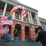 The Return of the Flags ceremony at the Massachusetts State House. 