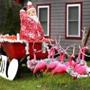 Maybe this homeowner on Maquan Street had the foresight to predict a warm Christmas as these pink flamingos pulling santa in a tropical shirt on the lush green grass of the front yard, seemed more appropriate for the current weather. 