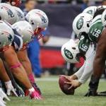 The New England Patriots and the New York Jets at the line of scrimmage for a snap during a NFL football game at Gillette Stadium in Foxborough, Mass. Sunday, Oct. 25, 2015. (Winslow Townson/AP Images for Panini)