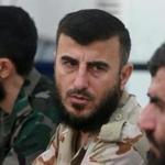 Zahran Alloush (center), commander of Jaysh al Islam, talked during a conference in the town of Douma, eastern Ghouta in Damascus, Syria. 