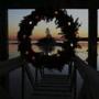 A Christmas wreath decorated with lights hangs at the end of a dock at sunset on Linekin Bay in East Boothbay, Maine, Tuesday, Dec. 18, 2007. The winter solstice arrives later this week, making these the shortest days of daylight during the year. (AP Photo/Pat Wellenbach)