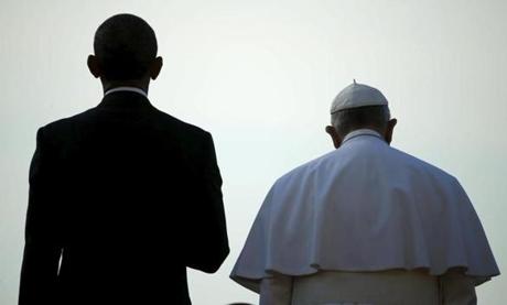 US President Barack Obama stands with Pope Francis during an arrival ceremony for the pope at the White House in Washington on Sept. 23.
