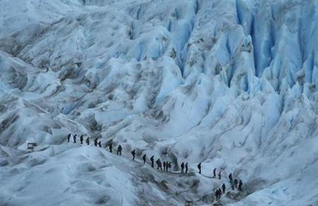 People hike on the Perito Moreno glacier in Los Glaciares National Park, part of the Southern Patagonian Ice Field, on Nov. 30 in Santa Cruz Province, Argentina. The Southern Patagonian Ice Field is the third largest ice field in the world. The majority of the almost 50 large glaciers in Los Glaciares National Park have been retreating during the past fifty years due to warming temperatures, according to the European Space Agency (ESA). The United States Geological Survey (USGS) reports that over 68 percent of the world's freshwater supplies are locked in ice caps and glaciers. The United Nations climate change conference began Nov. 30 in Paris. 
