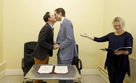 Richard Dowlin (lett), 35, and Cormac Gollogly, 35, are married by registrar Mary Claire Heffernan in the South Clonmel Community Care Centre in County Tipperary, on Nov. 17. Dowlin and Gollogly are the first gay couple to marry in Ireland. 
