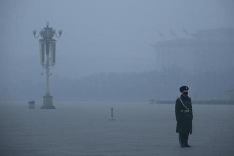 A Chinese paramilitary policeman wears mask to protect against pollution as he guards during heavy pollution day in Tiananmen Square on Dec. 22 in Beijing. Forty cities in north China, including Beijing, have issued alerts for air pollution, according to Beijing air pollution emergency management headquarters. Heavy smog has hit China's Beijing-Tianjin-Hebei region on three occasions since late November. 
