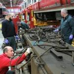 Boston, MA - 04/09/15 - Repair foreman Tom Pearson readies the propulsion unit (a sort of transmission for power distribution to a train's motors) of a Red Line train for repairs at the MBTA maintenance facility in South Boston. Lane Turner/Globe Staff Section: METRO Reporter: levinson Slug: 17mbtaolympics