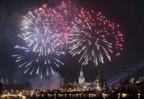 ireworks lit the night sky over the Kremlin's Spasskaya tower.  
