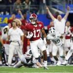 Running back Kenyan Drake of the Alabama Crimson Tide ran for 58-yards in the fourth quarter against the Michigan State Spartan.