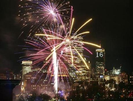 The Prudential Center was lit up to celebrate the New Year as an early fireworks display illuminated downtown Boston.
