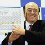 Kosuke Morita of Riken Nishina Center for Accelerator-Based Science pointed at a periodic table of the elements during a press conference on Dec. 31. A team of Japanese scientists have met the criteria for naming a new element, the synthetic highly radioactive element 113, more than a dozen years after they began working to create it. 