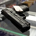 A Smith & Wesson M&P handgun awaited a buyer at North East Trading Co. in North Attleboro in 2013.