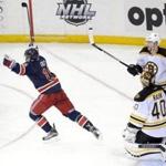 New York Rangers' Jesper Fast, left, celebrates his goal as Boston Bruins' Kevan Miller (86) and goaltender Tuukka Rask (40) look on during the third period of an NHL hockey game Monday, Jan. 11, 2016, at Madison Square Garden in New York. The Rangers defeated the Bruins 2-1. (AP Photo/Bill Kostroun)