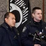 Boston, MA -- 01/12/16 -- Boston Police Officers Thuan Lai (left) and Vladimir Levichev (right) speak to the press at Boston Police headquarters on January 12, 2016, in Boston, Massachusetts. The officers rushed to the aid of 4-year-old Kyeesha Maxey, who was having seizures in her Dorchester home on Saturday evening. (Kayana Szymczak for the Boston Globe)