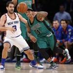 New York Knicks guard Jose Calderon (3) watches as Boston Celtics guard Isaiah Thomas (4) goes after the ball after Calderon stripped it from Thomas during the first half of an NBA basketball game at Madison Square Garden in New York, Tuesday, Jan. 12, 2016. (AP Photo/Kathy Willens)
