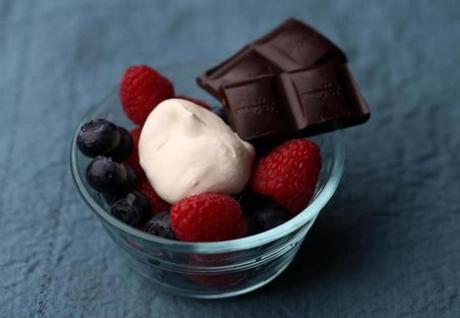 One of the recipes by chef Dawn Ludwig in her husband David?s book on eating well is for berries with fresh whipped cream and dark chocolate. 

