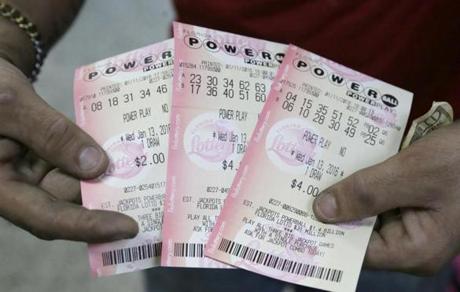 A customer showed his Powerball tickets in Hialeah, Fla., on Monday.

