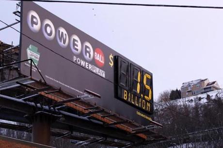 A billboard advertised the record Powerball jackpot Tuesday in downtown Pittsburgh.
