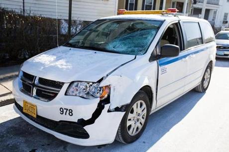 A van involved in Wednesday morning?s fatal crash in Dorchester sat along Morton Street as police investigated. 
