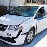 A van involved in Wednesday morning?s fatal crash in Dorchester sat along Morton Street as police investigated. 
