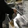 Newspapers were packaged at a Boston Globe delivery distribution center in Medfield earlier this month.