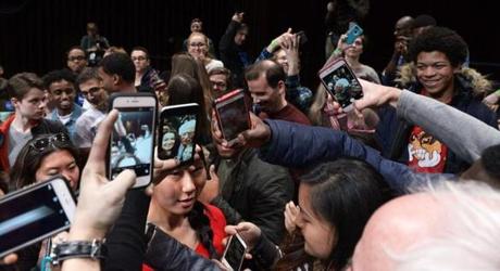 xxbernievoters- Presidential candidate U.S. Sen Bernie Sanders is surrounded by a crowd of young, selfie-seeking fans following a town hall meeting at Dartmouth College's Spaulding Auditorium in Hanover, N.H., on Thursday, Jan. 14, 2016. (Paul Hayes for The Boston Globe)
