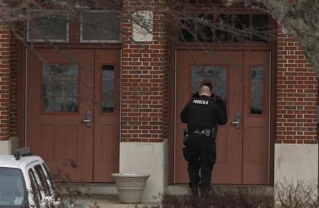 A police officer entered Arlington High School after the school received a bomb threat Tuesday.
