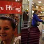 A sign reading, ?We?re Hiring!? was seen inside of the Roche Bros. store in Acton in October.