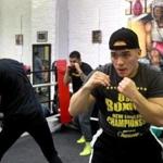 Lawrence, MA: 01-05-2016: Jesus Flores (left) loosens up before training session at the Canal Street Boxing Gym inn Lawrence, Mass. January 5, 2016. He, and Yamarco Guzman (left) and Xavier Verga (center, rear) training for an upcoming Golden Gloves boxing competition. Photo/John Blanding, Boston Globe staff story/Steven Rosenberg, NOWK ( 24nogoldengloves )