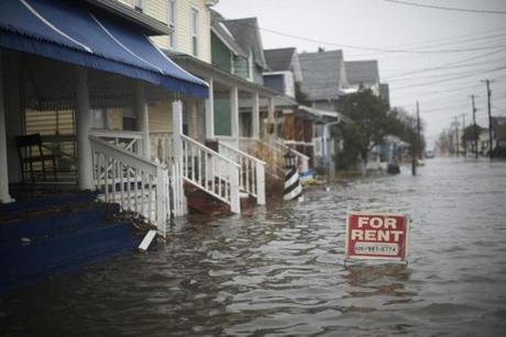 A for rent sign was submerged on flooded streets after a winter storm in Wildwood, N.J. 
