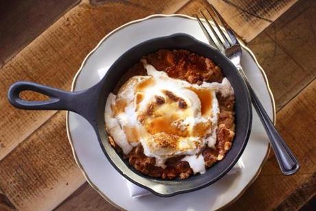 A hazelnut skillet cookie with Marshmallow Fluff and caramel.
