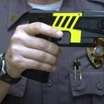 An officer held a stun gun used by his police department in Farmington, Conn.