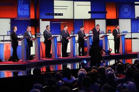 Republican presidential candidates waited  for the beginning of the Fox News - Google debate Thursday night.
