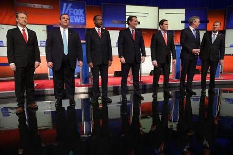 Republican presidential candidates posed for photographers before Thursday night?s debate. 
