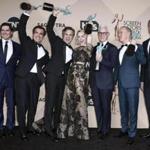 From left: Billy Crudup, Brian d'Arcy James, Mark Ruffalo, Rachel McAdams, John Slattery, Michael Keaton, and Liev Schreiber posed with the Screen Actors Guild Award for best cast performance in ?Spotlight.?