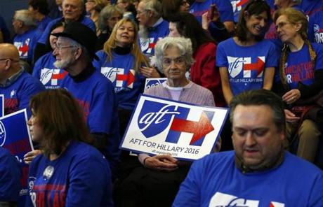 Supporters of Hillary Clinton held signs and wore T-shirts as they waited for her to arrive Tuesday morning at a rally in Nashua.
