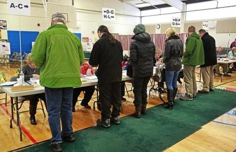 Voters came out to the polling station at Ledge Street Elementary School in Nashua, N.H.
