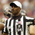 HOUSTON - NOVEMBER 23: Referee Mike Carey #94 calls a penalty during the game between the Houston Texans and the New England Patriots on November 23, 2003 at Reliant Stadium in Houston, Texas. The Patriots defeated the Texans 23-20 in overtime. (Photo by Ronald Martinez/Getty Images) Library Tag 12102006 Sports