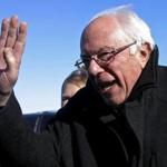 Bernie Sanders spoke to the media Friday after stepping off his campaign plane in Minneapolis.