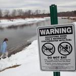 The Housatonic River has been polluted for decades. General Electric Co., which is moving its headquarters to Boston, objects to a new federal plan that would force it to spend hundreds of millions of dollars to clean the river.
