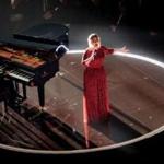 Adele performs during The 58th Grammy Awards Monday in Los Angeles.