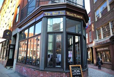 A missing poster for Zachary Marr was hung in the window of the Bell in Hand Tavern near Faneuil Hall. 
