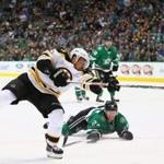 DALLAS, TX - FEBRUARY 20: Brad Marchand #63 of the Boston Bruins takes a shot against Cody Eakin #20 of the Dallas Stars in the second period at American Airlines Center on February 20, 2016 in Dallas, Texas. (Photo by Ronald Martinez/Getty Images)