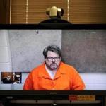 Jason Dalton was seen on closed circuit television during his arraignment Monday. 