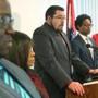 Ferguson Mayor James Knowles, center, spoke at a press conference earlier this month at the city?s community center. 