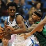 Feb 22, 2016; Minneapolis, MN, USA; Minnesota Timberwolves forward Andrew Wiggins (22) guarded by Boston Celtics guard Isiah Thomas (4) in the third quarter at Target Center. The Wolves win 124-122 over the Celtics. Mandatory Credit: Marilyn Indahl-USA TODAY Sports